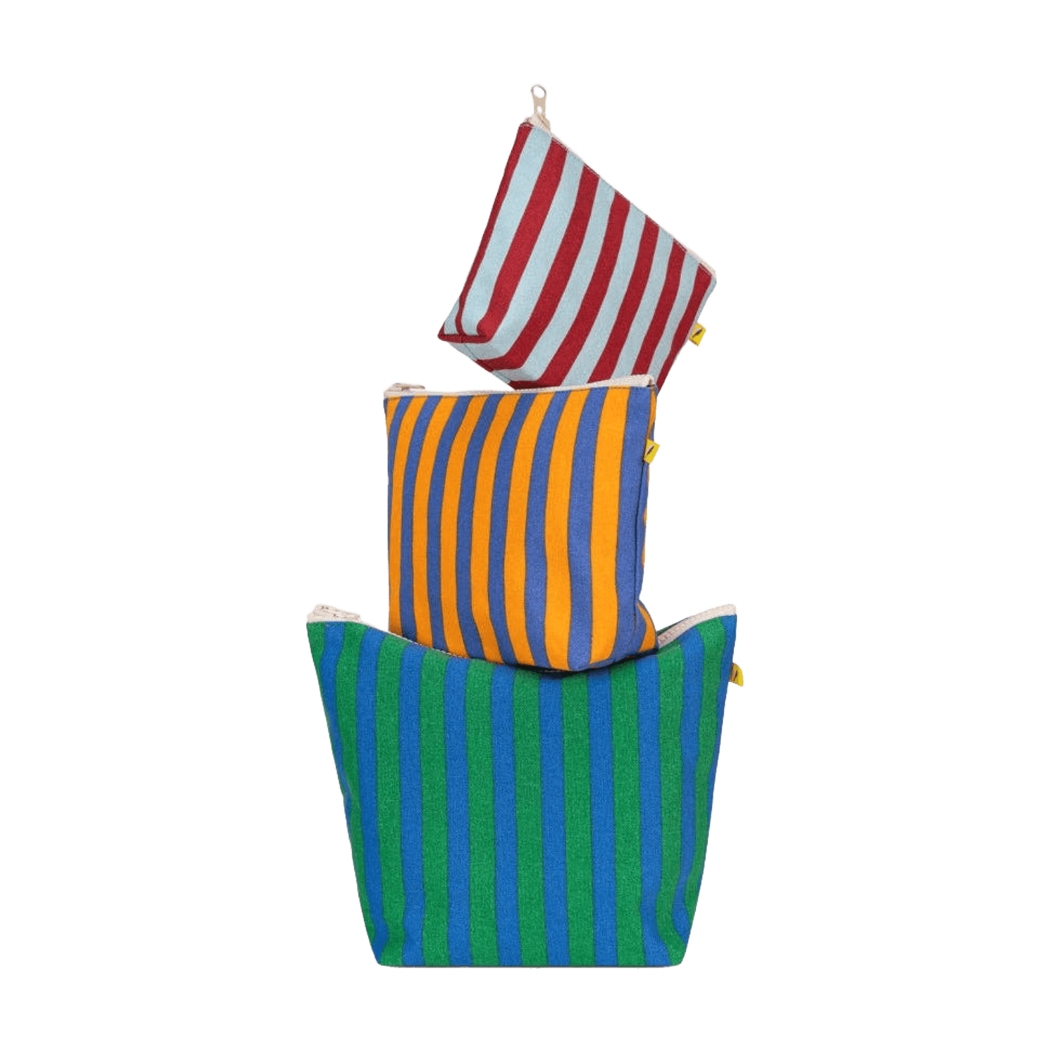 Three different sized striped pouches in green, orange, and red stacked on top of one another.
